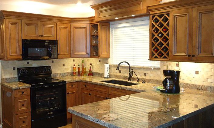 Modern kitchen with granite countertops and wooden cabinets