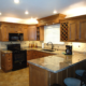 Modern kitchen with granite countertops and wooden cabinets